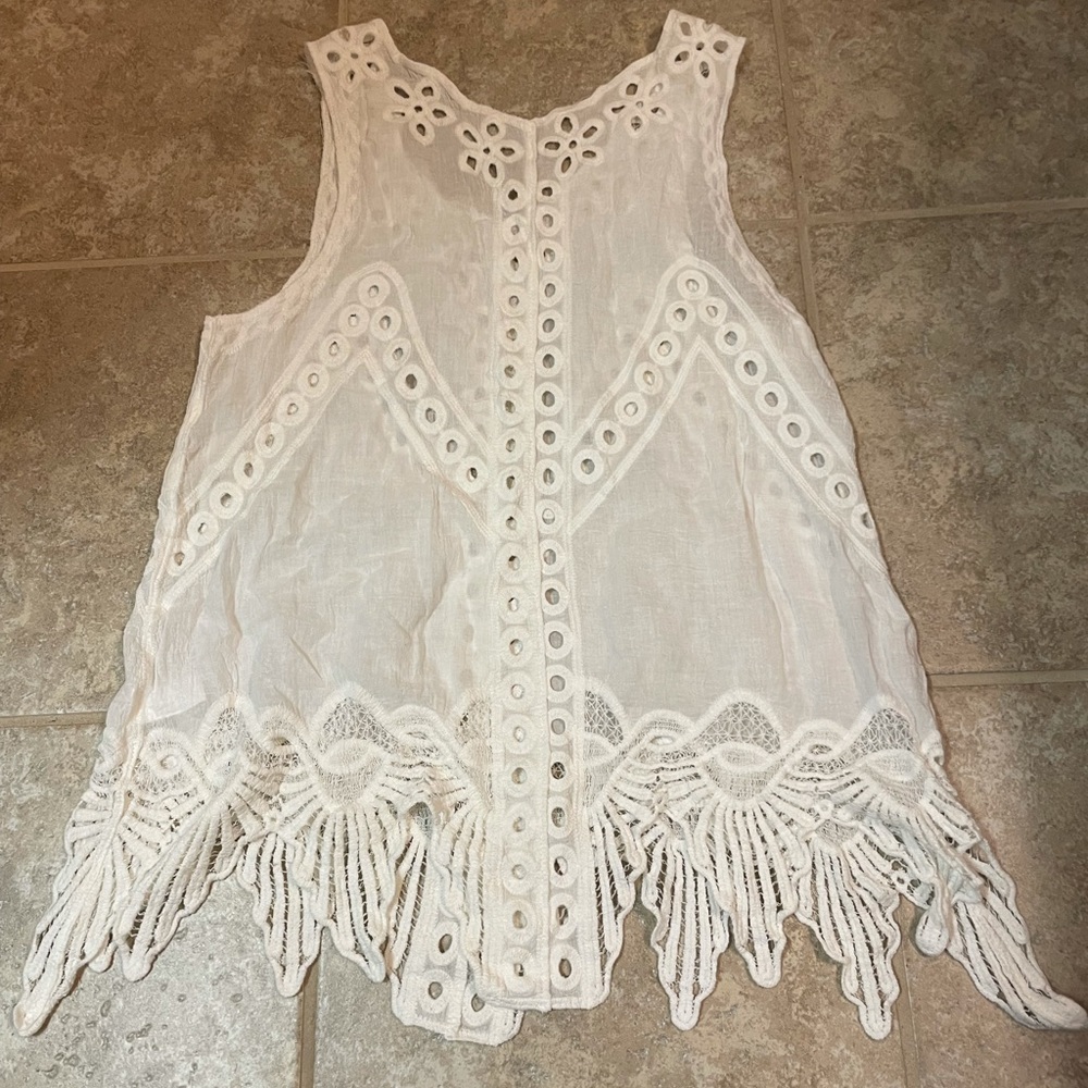 Size-Medium, never worn, summer shirt to layer and accessorize or swim cover up!